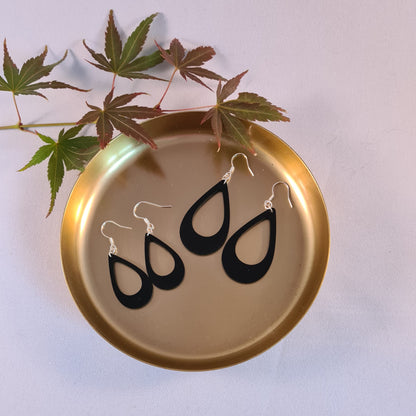 Zwarte open druppels